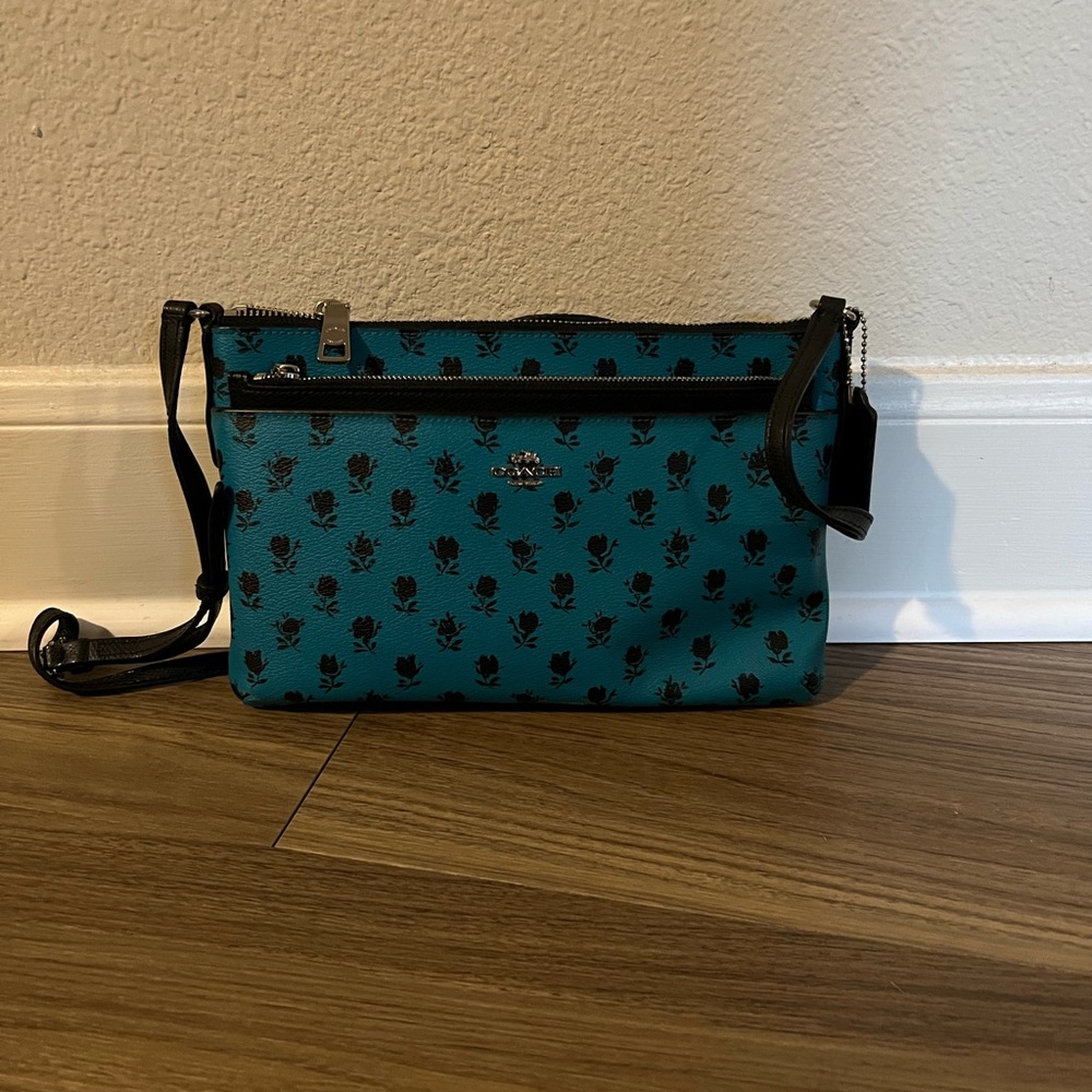Coach Crossbody Bag. Color turquoise with mini flowers